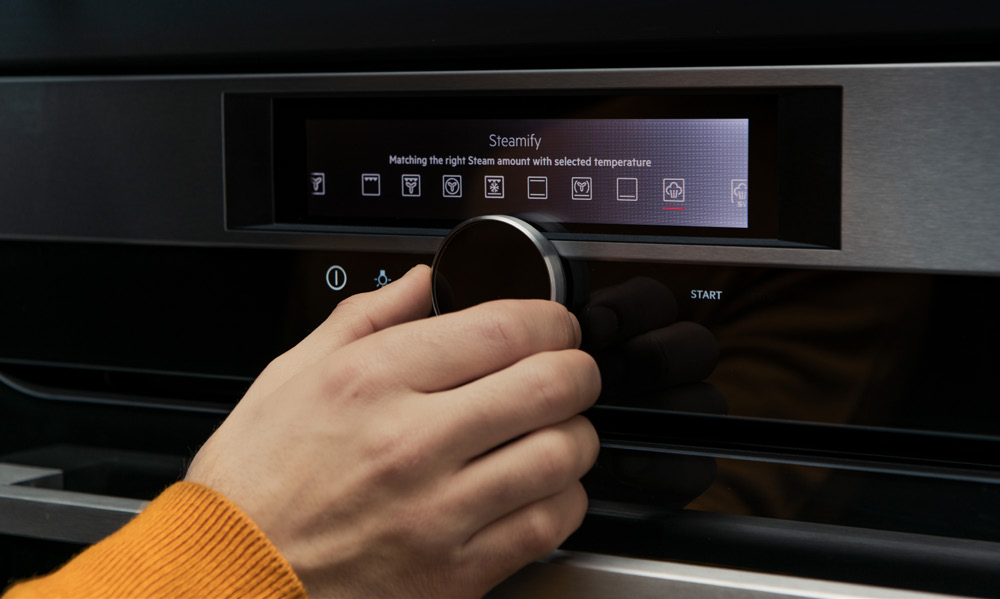 AEG MATTBLACK Bedienknopf eines Ofens für die automatische Dampffunktion.